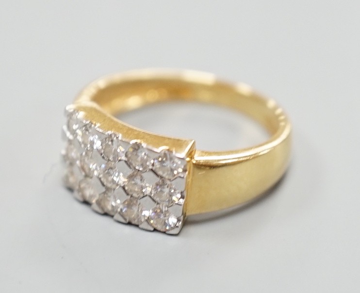 A modern 18ct gold and pave set diamond cluster ring, size K, gross weight 3.9 grams.